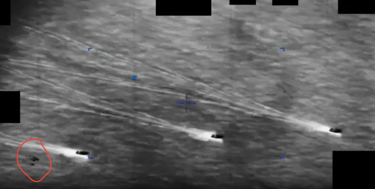 A UAP, or possibly more than one, appears on the lower left side of a classified video taken in Iran on August 2022. The red circle was added by The Epoch Times to clarify what the Department of War considered to be an unknown anomaly. (Department of War)