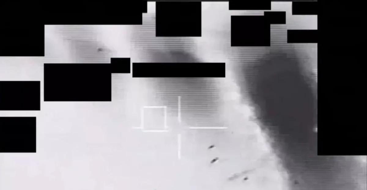 Fragments fall from the UAP after it was shot. (Department of War)