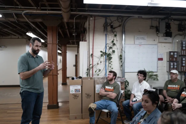 Democratic candidate for the U.S. Senate Zach Wahls speaks with campaign volunteers before they head out to canvas for votes in Cedar Rapids, Iowa, on May 31, 2026. (Scott Olson/Getty Images)