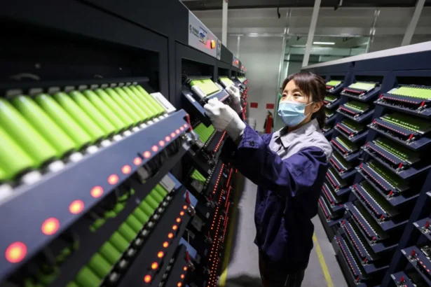 An employee works on a lithium battery production line at a factory in Huaibei, Anhui Province, China, on April 26, 2025. (STR/AFP via Getty Images)