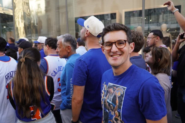 Tony Manfred said it felt like Sesame Street, with everyone in a good mood. “When the Knicks are good, you can feel it in the air,” he said while waiting on Sixth Avenue in New York on June 8, 2026. (Nicholas Zifcak/The Epoch Times)