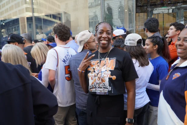 December Bails waits to be admitted to the security perimeter around Madison Square Garden for Game 3 of the NBA Finals in New York on June 8, 2026. (Nicholas Zifcak/The Epoch Times)
