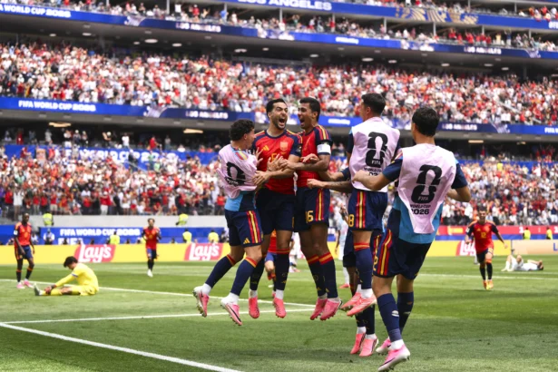 Mikel Merino #6 of Spain celebrates with his team mates scoring his team's second goal during the FIFA World Cup 2026 Quarter Final match between Spain and Belgium at Los Angeles Stadium in Inglewood, Calif., on July 10, 2026. (David Ramos/Getty Images)