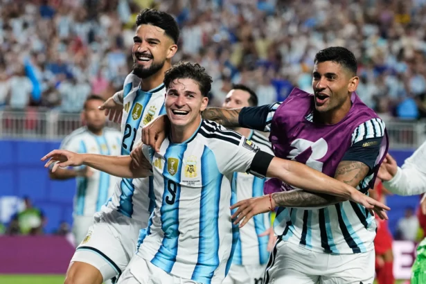 Argentina's Julian Alvarez (9) celebrates after scoring his side's second goal during the World Cup quarterfinal soccer match against Switzerland in Kansas City, Mo., Saturday, July 11, 2026. (Charlie Riedel/AP Photo)