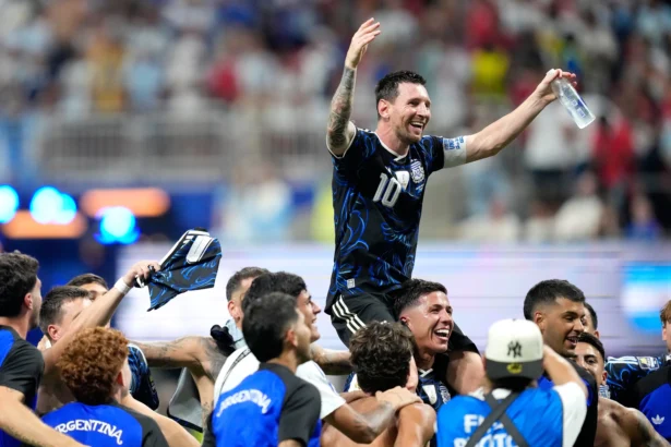 Argentina's Lionel Messi celebrates with his teammates at the end of the World Cup semifinal soccer match between England and Argentina in Atlanta on July 15, 2026. (Rebecca Blackwell/AP Photo)