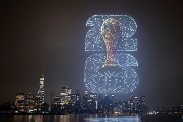 A FIFA World Cup Trophy visual is displayed against the Manhattan skyline during the FIFA Drone show at Liberty State Park in New York/New Jersey on July 15, 2026. (David Ramos/Getty Images)