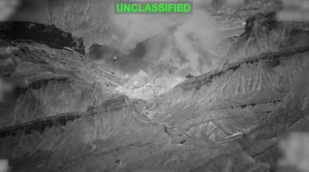 Smoke rises from an explosion at an unknown location, during what U.S. Central Command (CENTCOM) says are strikes on Iran, in this screen grab taken from a handout video released on July 18, 2026. (U.S. Central Command/Handout via Reuters)