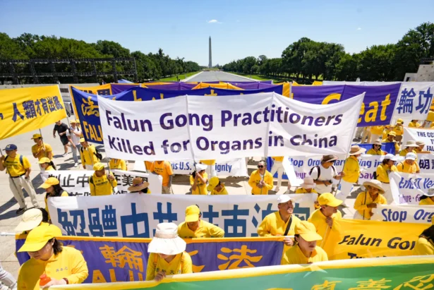 Falun Dafa practitioners gather for an annual rally calling for the end of the Chinese Communist Party’s ongoing persecution of Falun Gong in China, on the National Mall in Washington on July 23, 2026. (Samira Bouaou/The Epoch Times)