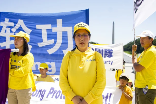 Lydia Dong at a Falun Gong rally at the Lincoln Memorial in Washington, on July 23, 2026. (Karina Li for The Epoch Times)