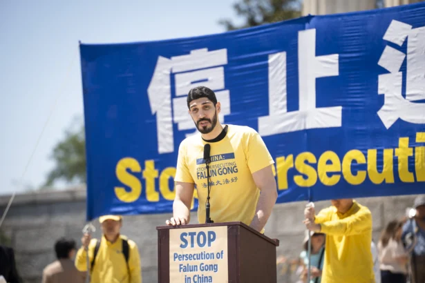 Enes Kanter Freedom, human rights advocate and former NBA player, speaks during an annual rally calling for the end of the Chinese Communist Party’s ongoing persecution of Falun Gong in China, at the Lincoln Memorial in Washington on July 23, 2026. (Madalina Kilroy/The Epoch Times)