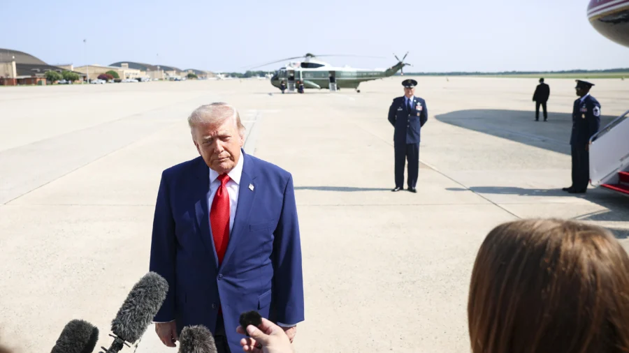 Trump Speaks to Reporters Aboard Air Force One En Route to Michigan
