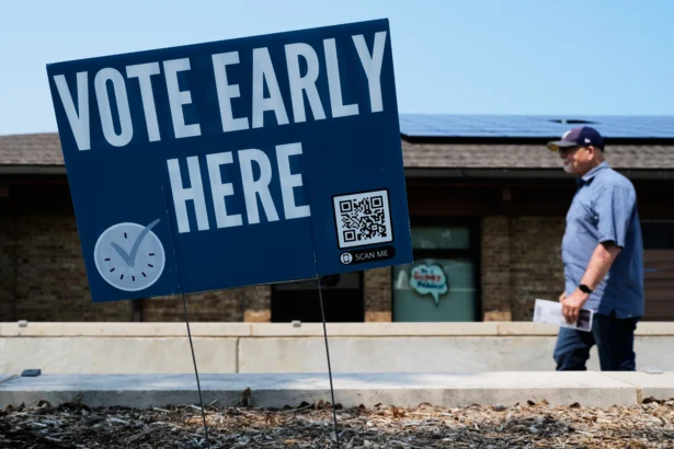 A voter walks to a polling place in Milwaukee on July 28, 2026. (Nam Y. Huh/AP)