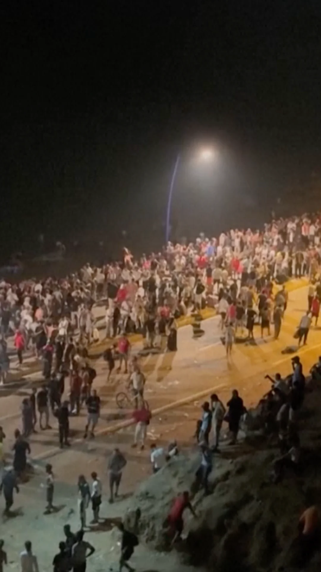 Migrants in Morocco's Fnideq Gather Near Border of Spain's Ceuta at Night