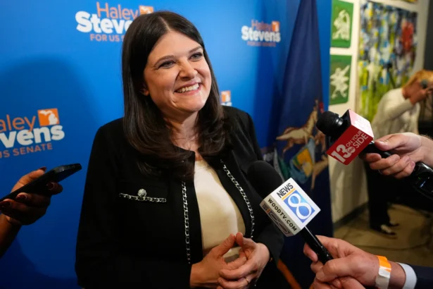 Rep. Haley Stevens (D-Mich.) talks to reporters during a campaign event in Grand Rapids, Mich., on Aug. 3, 2026. (Paul Sancya/AP Photo)