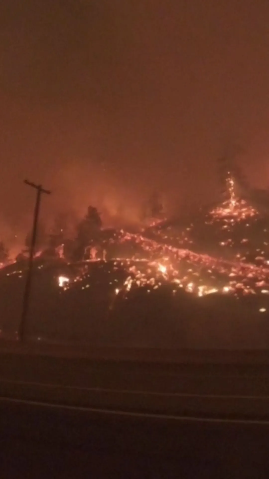 Motorist Captures Wildfires Lining Canadian Highway as Flames Light Up Night Sky