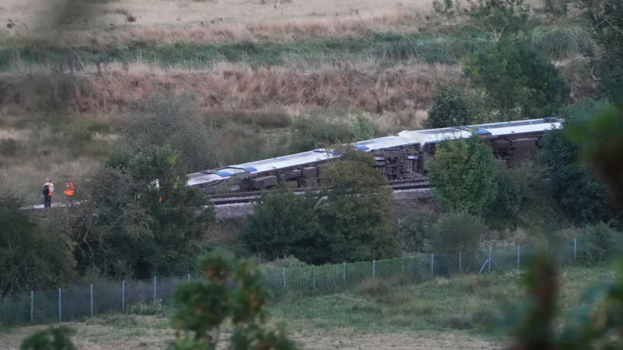 Passenger Train Derails and 11 People Injured After Carriages Overturn in Southern England