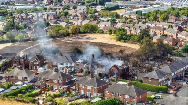 In this aerial view, fire-damaged homes are seen in Stoke-on-Trent, England, on Aug. 14, 2026. (Christopher Furlong/Getty Images)