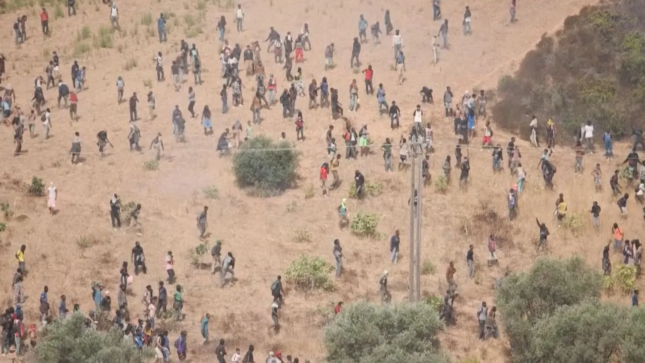 Moroccan Security Forces Disperse Migrants Trying to Cross Into Spain's Ceuta