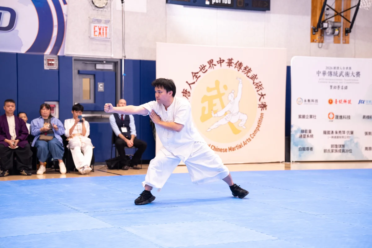 Lin Jingyao of Taiwan performs a Seven Star Praying Mantis form in the men's barehanded division final in Manhattan on Aug. 15, 2026. (Larry Dye/The Epoch Times)