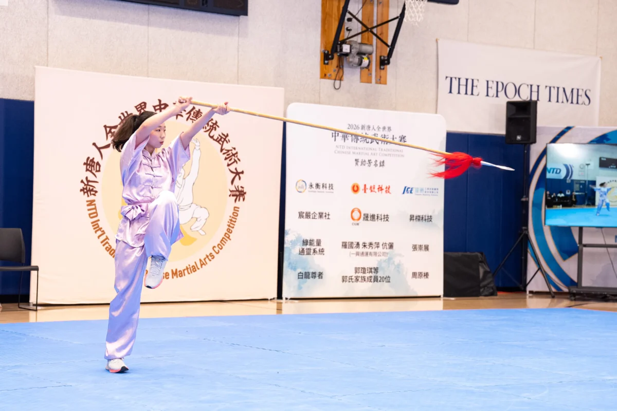 Wu Jiarou of Taiwan performs the Six Harmonies Spear in the women's weapons semifinal in Manhattan on Aug. 14, 2026. (Larry Dye/The Epoch Times)