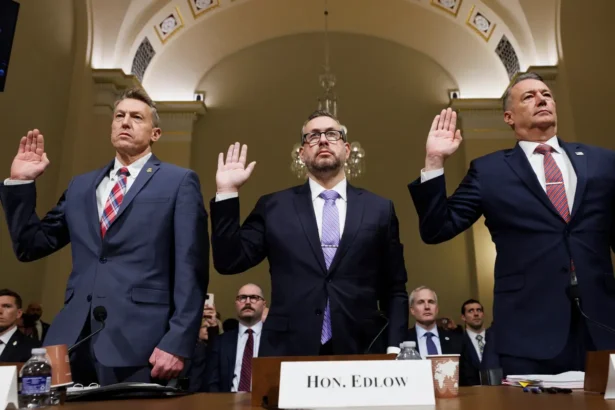 From left, Rodney Scott, commissioner of Customs and Border Protection, Joseph Edlow, director of U.S. Citizenship and Immigration Services, and Todd Lyons, acting director of the Immigration and Customs Enforcement, are sworn in during a House Committee on Homeland Security oversight hearing of the Department of Homeland Security: ICE, CBP, and USCIS, on Capitol Hill on Feb. 10, 2026, in Washington. (AP Photo/Tom Brenner)
