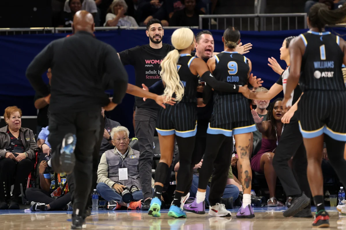 Former basketball player Enes Kanter Freedom and Natasha Cloud #9 of the Chicago Sky yell at one another during the second half between the Chicago Sky and the Indiana Fever at Wintrust Arena in Chicago on Aug. 23, 2026. (Michael Reaves/Getty Images)