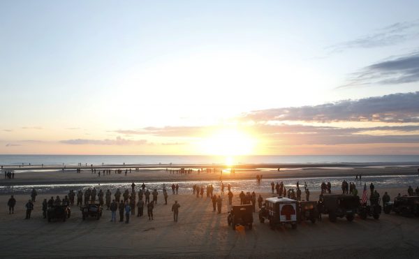World War II reenactors stand on Omaha Beach, in Normandy, France, at dawn on June 6, 2019, during commemorations of the 75th anniversary of D-Day. (Thibault Camus/Photo/AP)