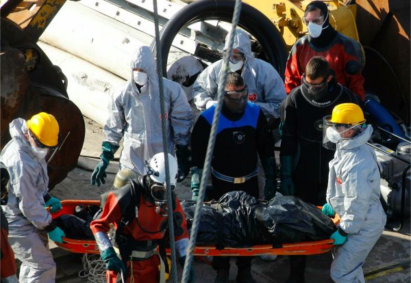 A body is carried away during the recovery operation at Margaret Bridge, the scene of the fatal boat accident in Budapest, Hungary, on June 11, 2019(Balazs Mohai/MTI via AP)
