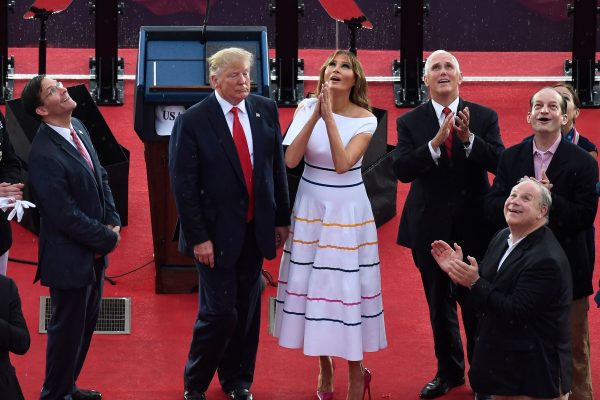 President Donald Trump, First Lady Melania Trump, Vice President Mike Pence (L) and acting Defense Secretary Mark Esper (R), among others, watch as the US Navy Blue Angels flyover during the "Salute to America" Fourth of July event at the Lincoln Memorial in Washington on July 4, 2019. (Susan Walsh/AFP/Getty Images)
