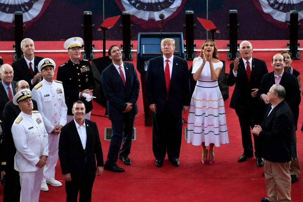 President Donald Trump, First Lady Melania Trump, Vice President Mike Pence (L) and acting Defense Secretary Mark Esper (R), among others, watch as the US Navy Blue Angels flyover during the "Salute to America" Fourth of July event at the Lincoln Memorial in Washington on July 4, 2019. (Susan Walsh/AFP/Getty Images)