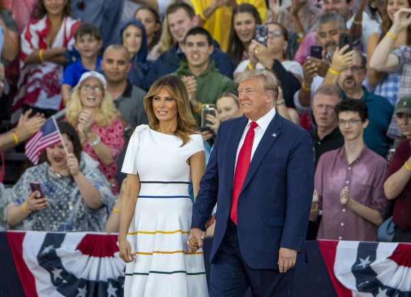 President Donald Trump and First Lady Melania Trump take the stage in Washington on July 4, 2019. (Tasos Katopodis/Getty Images)