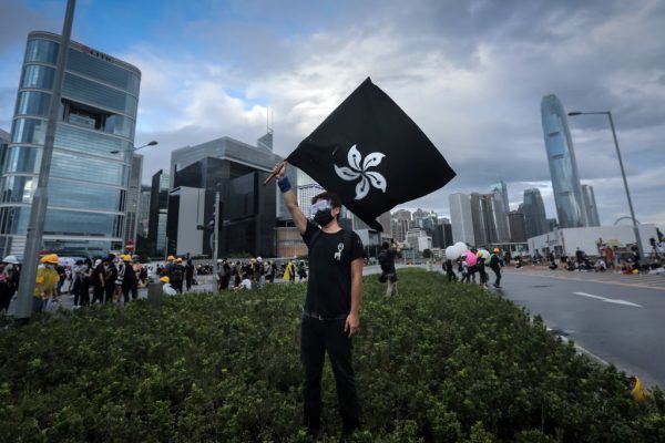 Protesters hold banners as they take part in a pro-democracy march in the Sha Tin district of Hong Kong on July 14, 2019. (Anthony Kwan/Getty Images)