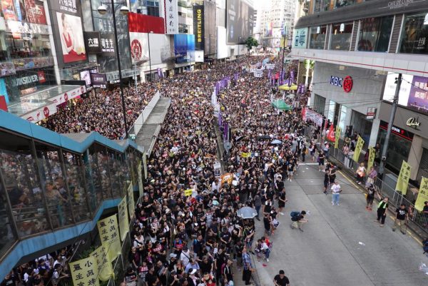 Protesters fill the streets in Hong Kong in a march against a controversial extradition bill on July 1, 2019. (Yu Gang/The Epoch Times)