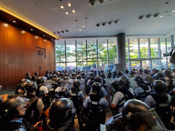 Police officers on guard inside the Legislative Council on July 1, 2019. (Sun Qingtian/The Epoch Times)