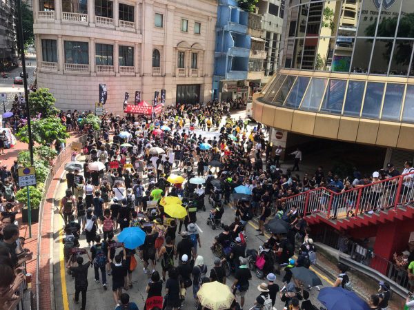 Protesters begin to march from Victoria Park in Hong Kong on July 1, 2019. (Lin Yi/The Epoch Times)