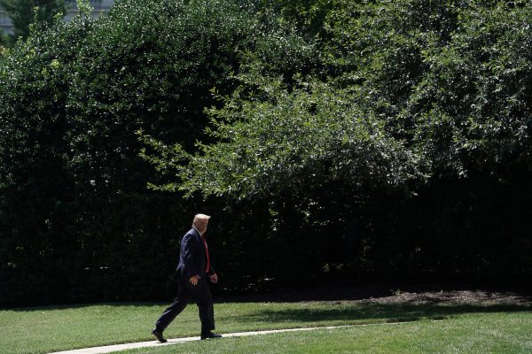 President Donald Trump walks back to the White House on July 30, 2019, in Washington, D.C. Trump traveled to Williamsburg, Virginia, to deliver remarks at the 400th Anniversary of the first representative legislative assembly at the historic Jamestown settlement. (Photo by Chip Somodevilla/Getty Images)