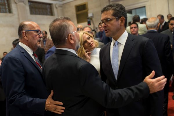 Pedro Pierluisi with lawmakers