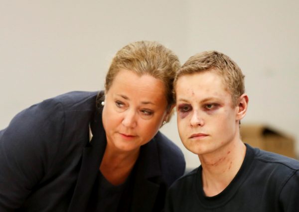 Philip Manshaus (R), who is suspected of an armed attack at Al-Noor Islamic Centre Mosque and killing his stepsister and his lawyer Unni Fries appear in court in Oslo, Norway, on Aug. 12, 2019. (NTB Scanpix/Cornelius Poppe via Reuters)
