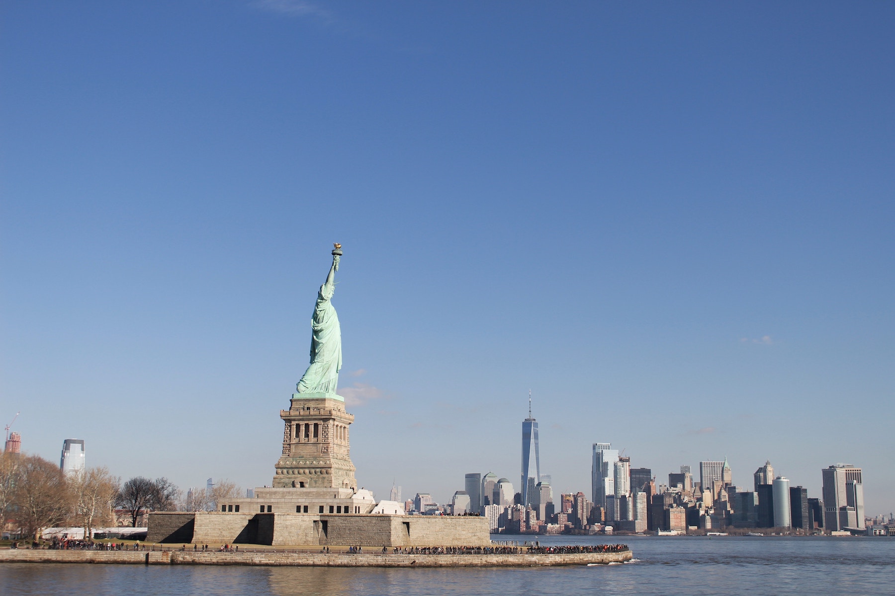 Statue of Liberty on Ellis Island. (@elevi1022/Unsplash)