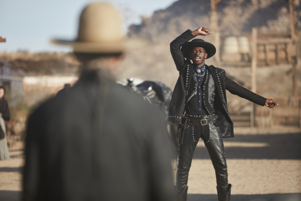 Lil Nas X (R) and Sam Elliott in a scene from Doritos’s 2020 Super Bowl NFL football spot. (Doritos via AP)