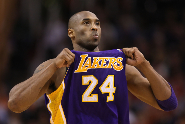 Kobe Bryant adjusts his jersey during a game against the Phoenix Suns in Phoenix, Ariz., on Feb. 19, 2012. (Christian Petersen/Getty Images)