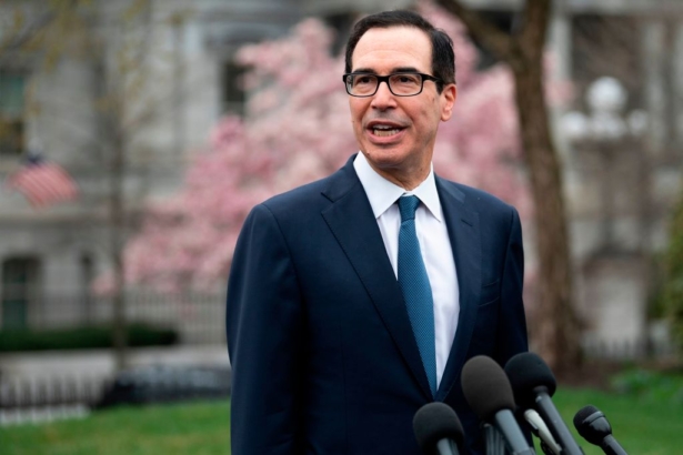 Treasury Secretary Steven Mnuchin speaks with reporters outside White House in Washington, on March 13, 2020. (Jim Watson/AFP/Getty Images)