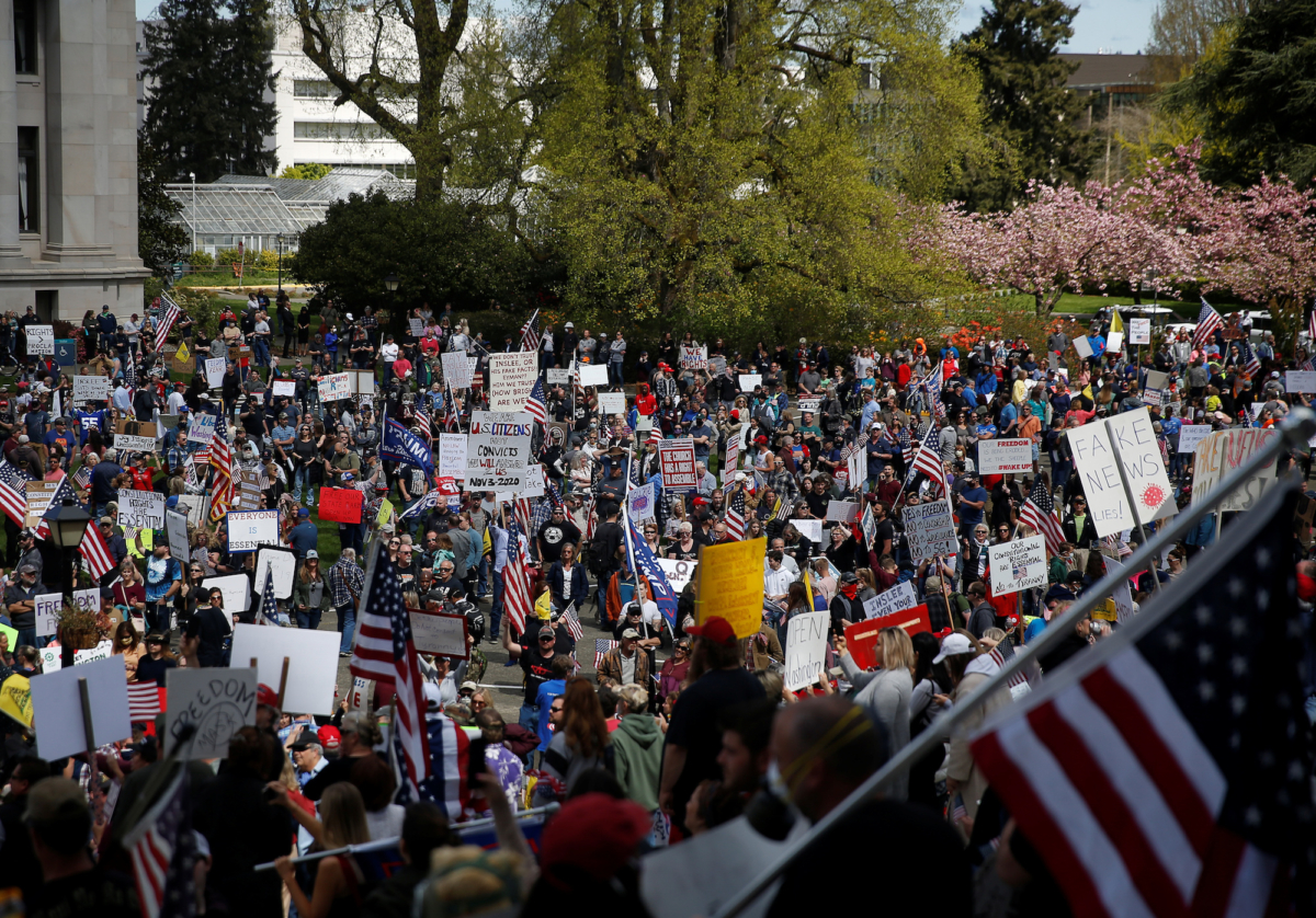 Protesters rally against an extended stay-at-home order at the Capitol building in Olympia, Washington, on April 19, 2020. (Lindsey Wasson/Reuters)