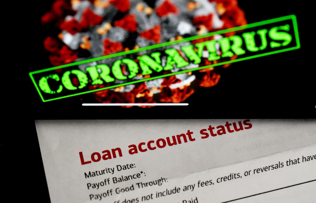 A loan statement account status and coronavirus sign