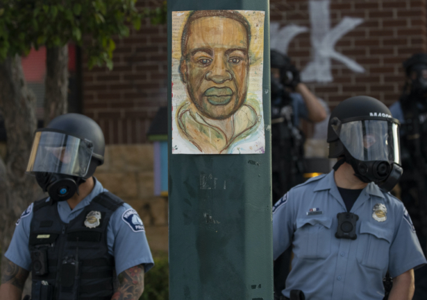 Minnesota police stand outside the department's 3rd Precinct in Minneapolis on May 27, 2020. (Carlos Gonzalez/Star Tribune via AP)