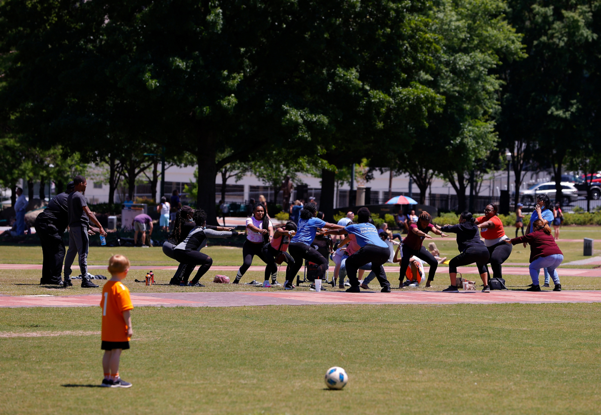 Park-goers are seen inside Centennial Olympic Park in Atlanta, Ga., on May 2, 2020. (Kevin C. Cox/Getty Images)