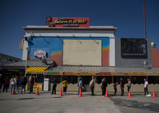 People wait in line for fries on the boardwalk in Ocean City, Md., on May 10, 2020. (Eric Thayer/Getty Images)