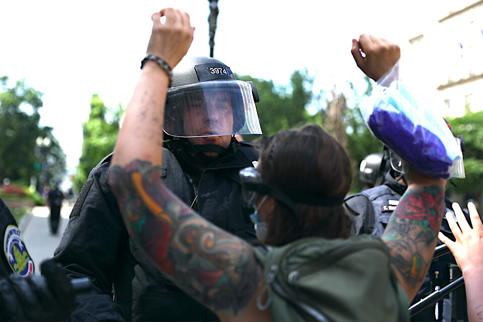 Police clear H street and Black Lives Matter Plaza after protesters set up an autonomous zone the previous night, just north of the White House in Washington on June 23, 2020. (Charlotte Cuthbertson/The Epoch Times)