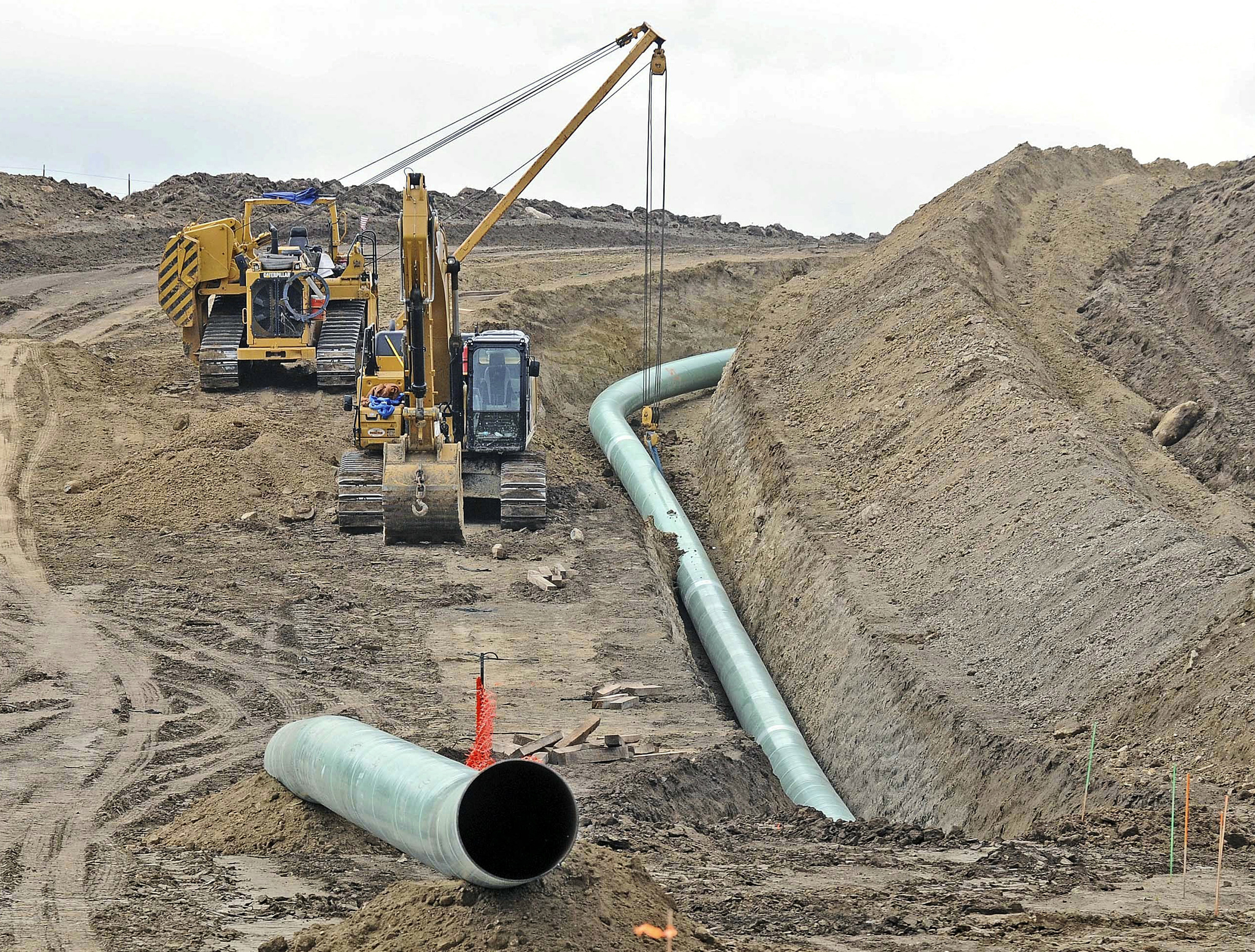 Heavy equipment is seen at a site where sections of the Dakota Access pipeline were being buried near the town of St. Anthony in Morton County, N.D., on Oct. 5, 2016. (Tom Stromme/The Bismarck Tribune via AP)