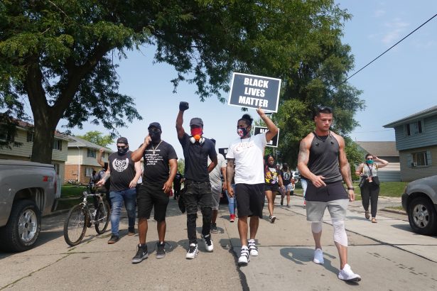 Pemonstrators march in protest of last night's police shooting, in Kenosha, Wis., on Aug. 24, 2020. (Scott Olson/Getty Images)